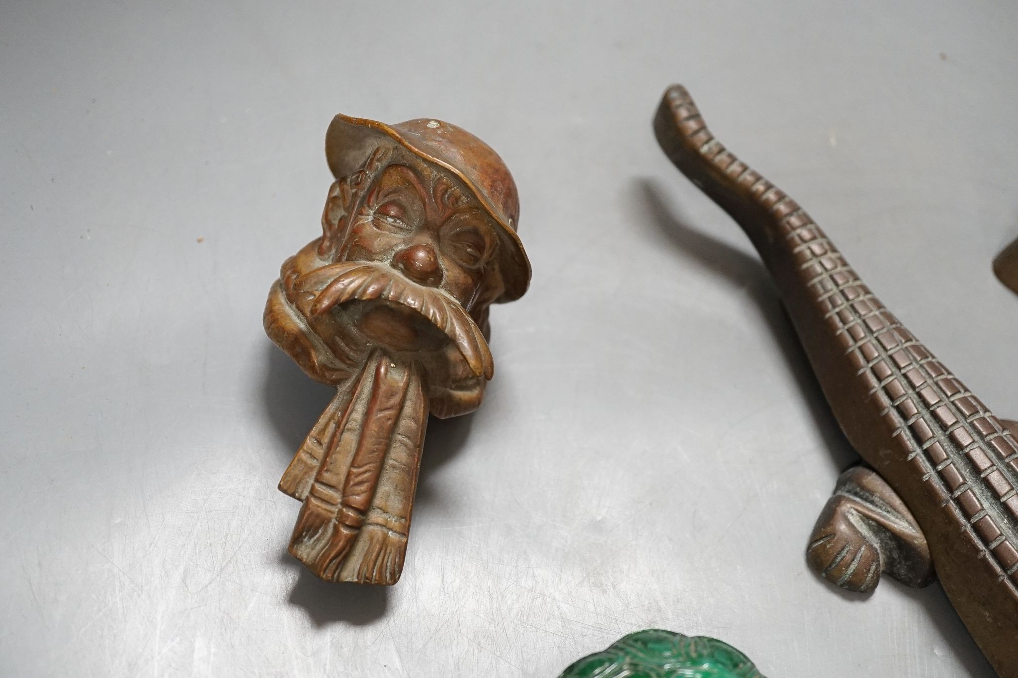 A Bruce Bainsfather Cast brass bottle stopper, 13cm, WMF cruet stand and 7 other items